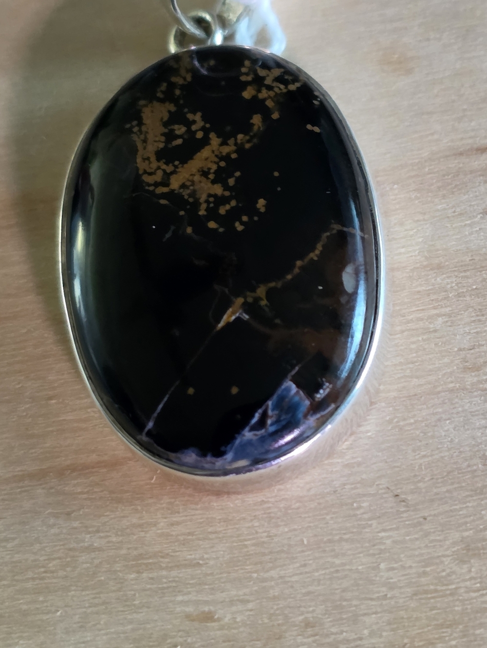 Pietersite Oval Black  And Blue Stone Pendant with Pinkish Brown Speckle.